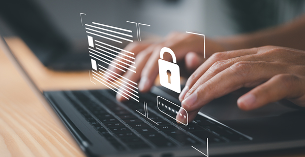 hands typing on a laptop keyboard with a security lock icon and password field overlay